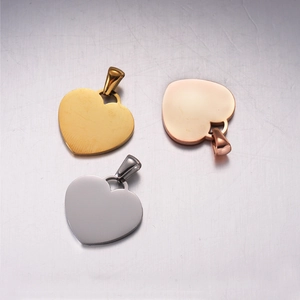 Polished stainless steel heart pendants in gold, silver, and rose gold with bails