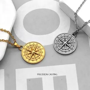 Vintage compass pendant necklace in gold and silver finish with detailed engraving