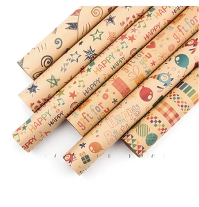 Rolls of kraft wrapping paper with music notes and stars patterns for birthday gifts