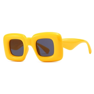 Futuristic oversized square thick frame sunglasses in glossy yellow with dark lenses