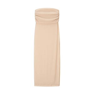 Detail of apricot strapless dress showing ribbed knit texture and side slit design