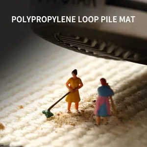 Durable polypropylene entrance mat with anti-slip looped pile texture for sand removal
