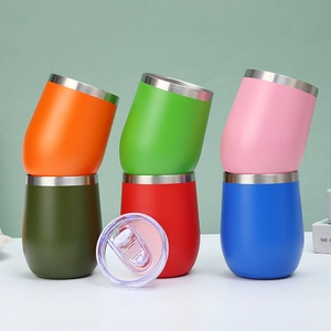 Detailed stack of colorful 12oz stainless steel insulated egg tumblers with lids