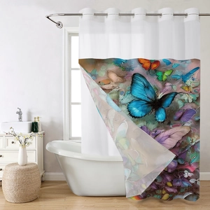 Artistic bathroom shower curtain detail with blue butterfly print and metal grommets