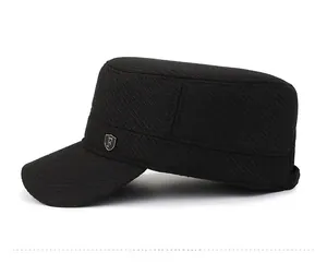 Side view of black cadet cap with textured twill fabric and silver metal shield emblem