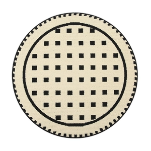 Thick round cream woven rug with black geometric squares and non-slip backing