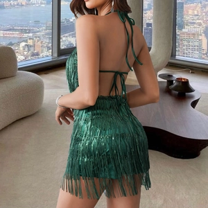 Elegant green sequined fringe backless halter dress shown from behind on model