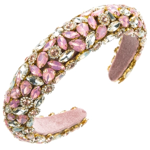 Detail shot of pink crystal jeweled padded headband with velvet lining and sparkles