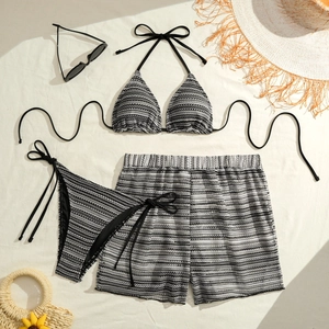 Three-piece black and white striped crochet bikini set with halter top and matching shorts