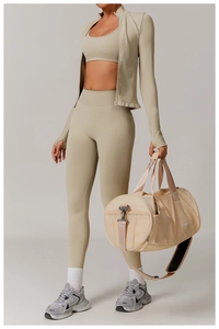 Detailed view of seamless oatmeal yoga set including jacket, sports bra and high waist leggings