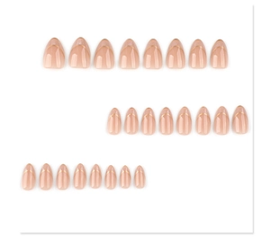 Flat lay of 24 almond press-on nails with nude base and gold French curve details