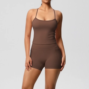Detailed view of chocolate brown yoga set featuring racerback tank and high-waist shorts