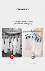 Space-saving blue plastic clothes hanger with multiple clips for drying socks and laundry