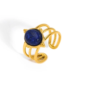 Vintage gold stainless steel open ring featuring a natural deep blue oval gemstone