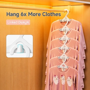 Space-saving vertical white plastic clothes hangers for baby and kids closet storage