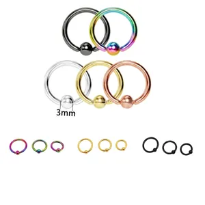 Detail of 3mm bead captive ring in stainless steel available in five vibrant finishes