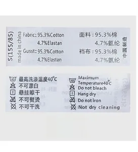 Detail of the laundry label showing 95.3% cotton and 4.7% elastane fabric composition