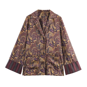Women's paisley print shirt with contrast striped cuffs on a clean white background