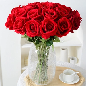 Realistic red silk roses bouquet in a crackle glass vase for elegant home decor