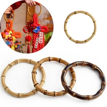 Detail of round bamboo handles with natural knots for DIY handbag and craft design