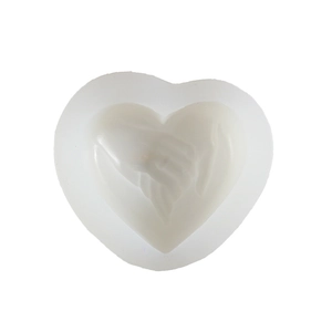 Macro detail of a heart-shaped silicone mold featuring an embossed hands-holding pattern