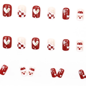 24pcs short Christmas press-on nails featuring Santa Claus and snowflake glitter designs
