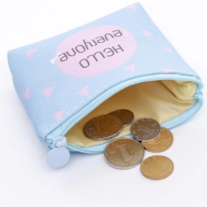 Close-up of light blue PU leather coin purse showing interior storage for metal coins