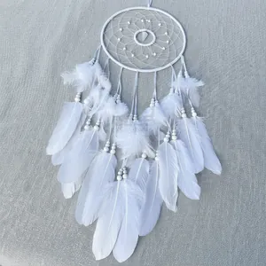 Bohemian dreamcatcher with white feathers and teardrop pendant for home wall decoration