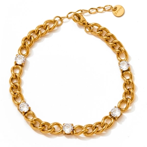 Gold stainless steel Cuban chain bracelet featuring five inset white zircon crystals