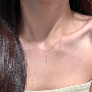 Elegant gold-tone Y-shape necklace featuring sparkling teardrop zircon tassels for women