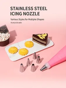 Detail of five stainless steel piping tips and a pink reusable EVA pastry bag for baking