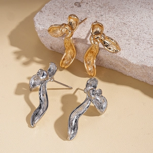 Abstract orchid petal stud earrings in polished gold and silver finishes for women