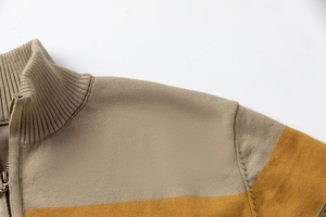 Detail of khaki and ginger turtleneck knit sweater with zipper and ribbed collar