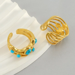 Detail of vintage 18k gold plated stainless steel ring with malachite stone inlay