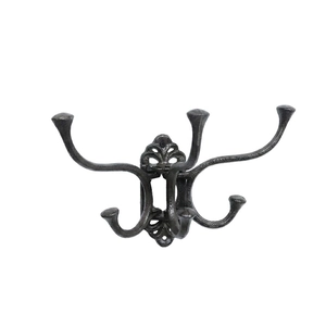 Vintage cast iron swivel hook with four rotatable arms for wall mounted coat storage