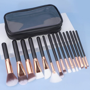 14-piece makeup brush set with rose gold ferrules and a semi-transparent black bag