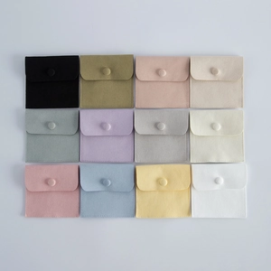 Set of 12 multi-color microfiber velvet jewelry pouches with snap button closures