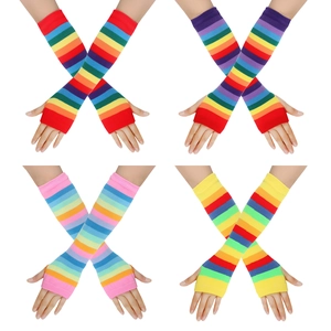 Detail of four colorful rainbow striped knitted long fingerless gloves and arm warmers