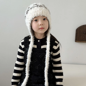 Plush winter earflap hat for kids featuring white faux fur and ethnic jacquard pattern