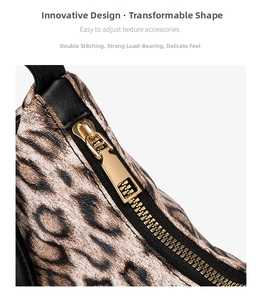 Detailed macro of leopard print leather texture and premium gold metal zipper on handbag