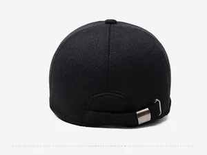 Detailed back view of black wool baseball cap with adjustable metal buckle strap