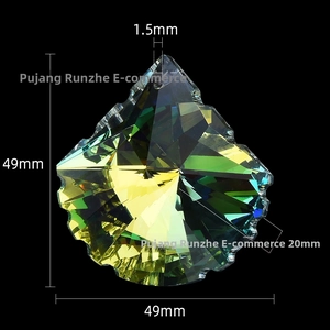 Detail view of 49mm iridescent crystal glass suncatcher pendant with multi-faceted cut