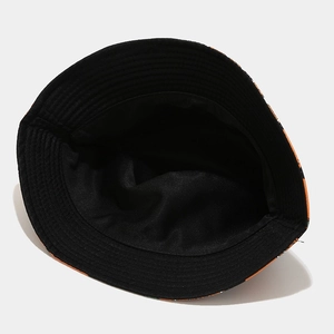 Detailed interior view showing high-quality stitching and black lining of the bucket hat
