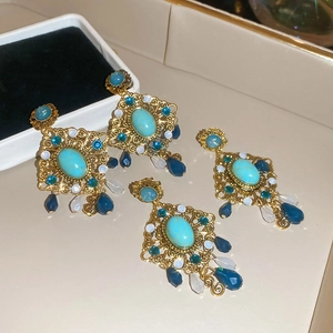 Vintage gold filigree resin rhombic drop earrings with turquoise beads and blue crystals