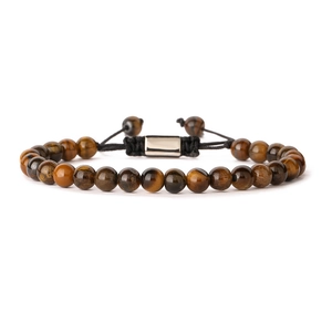 Detailed view of natural tiger eye beads with woven black cord and silver metal clasp