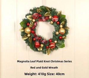 Close-up of 40cm Christmas wreath with plaid bow and gold magnolia leaves details