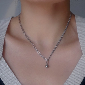 Asymmetric stainless steel chain necklace with polished silver ball pendant for women