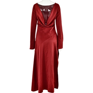 Detail view of the deep red satin backless dress with elegant draped cowl back design