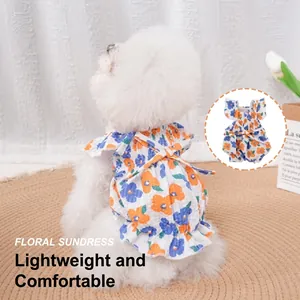 Detail showing floral sundress for pets with ruffles, tie-back bow and breathable fabric
