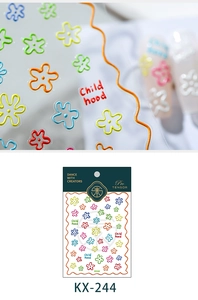 Macro detail of 3D embossed floral nail stickers featuring colorful 5-petal flower designs